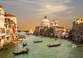 Venice, the Grand canal, the Cathedral of Santa Maria della Salute and gondolas with tourists, top view Royalty Free Stock Photo