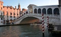 The sun sets over Rialto, in Venice, Italy Royalty Free Stock Photo