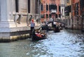 Venice city with gondoliers and gondolas with tourists, Italy