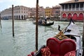 Beautiful panoramic view to the Grand canal intense gondolas marine traffic in a sunny spring day. Royalty Free Stock Photo