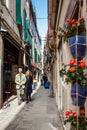 Tourists and locals walking around the beautiful streets of Venice in a sunny early spring day Royalty Free Stock Photo