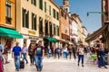 Tourists and locals walking around the beautiful streets of Venice in a sunny early spring day Royalty Free Stock Photo