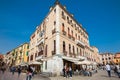 Tourists and locals walking around the beautiful streets of Venice in a sunny early spring day Royalty Free Stock Photo