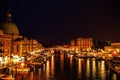 VENICE, ITALY - AUGUST 21, 2016: Famous architectural monuments, ancient streets and facades of old medieval buildings at night Royalty Free Stock Photo