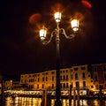 VENICE, ITALY - AUGUST 21, 2016: Famous architectural monuments, ancient streets and facades of old medieval buildings at night Royalty Free Stock Photo