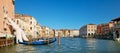 Venice, Italy - August 14, 2017: Giant hands up from the water of the Grand Canal to support the building. This powerful report on