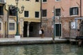 Girl on the promenade of Venice takes a selfie