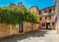 VENICE, ITALY - August 03, 2019: Narrow pedestrian streets of Venice bitween the channels. Some quiet places almost without people Royalty Free Stock Photo