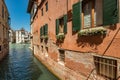 VENICE, ITALY - August 03, 2019: Narrow pedestrian streets of Venice bitween the channels. Some quiet places almost without people