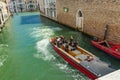 VENICE, ITALY - August 02, 2019: One of the thousands of lovely cozy corners in Venice on a clear sunny day. The Fire fighters