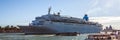 VENICE, ITALY - AUGUST 19, 2016: Panoramic view on the cityscape of Grand Canal and large moving luxury cruise liner