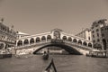 Venice.Italy. Tourists in gondolas sailing on the grand canal, toned- sepia Royalty Free Stock Photo