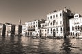 Venice.Italy.Tourists in gondolas sailing on the grand canal, toned- sepia Royalty Free Stock Photo