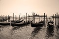 Venice.Italy. Tourists in gondolas sailing on the grand canal, toned- sepia Royalty Free Stock Photo