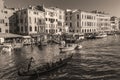 Venice.Italy:Tourists in gondolas sailing on the grand canal, toned- sepia Royalty Free Stock Photo