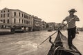 Venice.Italy:Tourists in gondolas sailing on the grand canal, toned- sepia Royalty Free Stock Photo