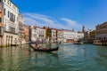 VENICE, ITALY - AUGUST 21, 2016: Tourists ride in gondola in Grand Canal on August 21, 2016 in Venice Italy Royalty Free Stock Photo