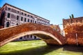 VENICE, ITALY - AUGUST 21, 2016: View on the cityscape and lovely bridge on the canal of Venice on August 21, 2016 in Venice Royalty Free Stock Photo