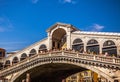 VENICE, ITALY - AUGUST 17, 2016: View on the cityscape and lovely bridge on the canal of Venice on August 17, 2016 in Venice, Ital Royalty Free Stock Photo