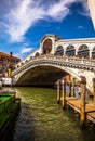 VENICE, ITALY - AUGUST 17, 2016: View on the cityscape and lovely bridge on the canal of Venice on August 17, 2016 in Venice, Ital Royalty Free Stock Photo