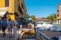 VENICE, ITALY - August 27, 2021: View of group of scouts walking along the canals of Venice, Italy