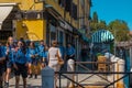 VENICE, ITALY - August 27, 2021: View of group of scouts walking along the canals of Venice, Italy