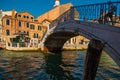 VENICE, ITALY - August 27, 2021:  View of people crossing the bridge over the beautiful canals of Venice Royalty Free Stock Photo