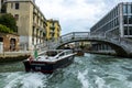 Water gendarmerie on a boat patrols canals of the city of Venice Royalty Free Stock Photo