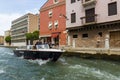 Water gendarmerie on a boat patrols canals of the city of Venice Royalty Free Stock Photo