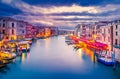 Venice, Italy. Beautiful sunset colors on Grand Canal, Rialto Bridge