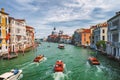 Venice, Italy. Beautiful view of Grand Canal, tourist boats and Basilica Santa Maria della Salute in background Royalty Free Stock Photo