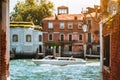 Venice, Italy. Beautiful view of the typical channels canals in Venezia city with defocused trip boat