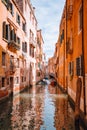 Venice, Italy. Beautiful view of the typical channels canals in Venezia. With small boat and Gondolas transportation Royalty Free Stock Photo