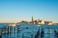 Venice, Italy - 15.08.2018: Beautiful view of the Venetian lagoon. The gondola is a traditional transport in Venice Royalty Free Stock Photo