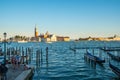 Venice, Italy - 15.08.2018: Beautiful view of the Venetian lagoon. The gondola is a traditional transport in Venice Royalty Free Stock Photo