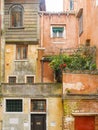 Italy, Venice, homes, old Jewish Ghetto, 4 levels, balcony with flowers Royalty Free Stock Photo