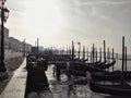 VENICE, ITALY - 06 30 2023: Canal with two gondolas in Venice, Italy.