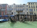 Venice, Italy, a city on the water, gondolas moored to the pier.