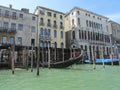 Venice, Italy, a city on the water, gondolas moored to the pier.