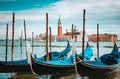 Venice, Italy. Close up of Gondolas and San Giorgio Maggiore church on Grand Canal in background Royalty Free Stock Photo