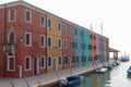 Venice, Italy. Colorful houses in Burano island. Canal view with boats. Royalty Free Stock Photo
