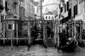 Venice, Italy, December 28, 2018 evocative black and white image of a mooring for gondolas Royalty Free Stock Photo