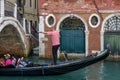 VENICE, ITALY/EUROPE - OCTOBER 12 : Gondolier plying his tradein Venice Italy on October 12, 2014. Unidentified people. Royalty Free Stock Photo