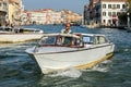 VENICE, ITALY/EUROPE - OCTOBER 12 : Motorboat cruising down the