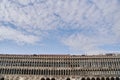 Venice, Italy - 10.12.2021: Facade of the arcade building of Procuratie Vecchie on St. Mark Square in Venice, Italy