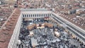 Venice, Italy - February 17, 2015: Air view to famous San Marco square in Venice, Italy during mask festival. Royalty Free Stock Photo
