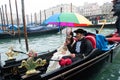 Venice, Italy, 2 february 2008. Beautiful couple carnival mask in Venice during mardi gras parade Royalty Free Stock Photo