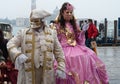 Venice, Italy, 2 february 2008. Beautiful couple carnival mask in Venice during mardi gras parade Royalty Free Stock Photo