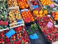 boxes with fresh vegetables , berries and fruits