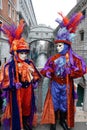 Venice, Italy, 1 february 2008. Couple of beautiful carnival mask in Venice during mardi gras parade Royalty Free Stock Photo